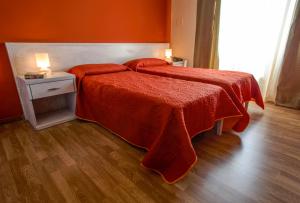 Posteľ alebo postele v izbe v ubytovaní Locanda Scirocco