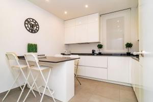 Kuchnia lub aneks kuchenny w obiekcie Juan Bravo Suites