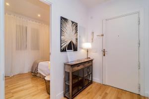 Łóżko lub łóżka w pokoju w obiekcie Juan Bravo Suites