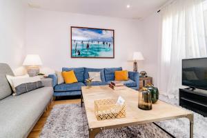 Telewizja i/lub zestaw kina domowego w obiekcie Juan Bravo Suites