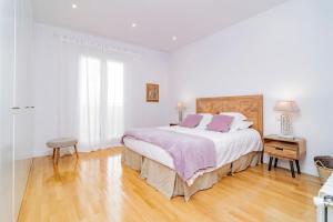 Łóżko lub łóżka w pokoju w obiekcie Juan Bravo Suites