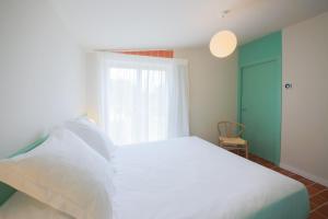Terra Aurea Aparthotel客房内的一张或多张床位