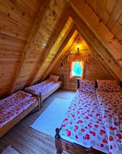 Letto o letti in una camera di Nika
