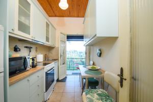 ครัวหรือมุมครัวของ Mon Reve House