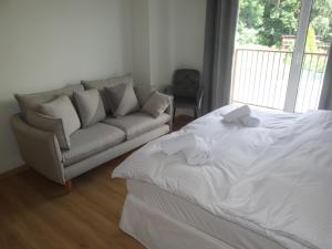 Posteľ alebo postele v izbe v ubytovaní 4family *RESORT*SPA*