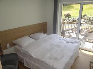 Posteľ alebo postele v izbe v ubytovaní 4family *RESORT*SPA*