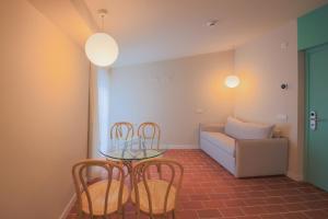 Terra Aurea Aparthotel客房内的一张或多张床位