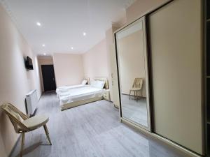 A bed or beds in a room at Hotel N