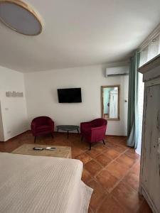 TV a/nebo společenská místnost v ubytování Casa Le Moire