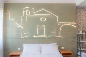 Voodi või voodid majutusasutuse RUDINI' CHARMING ROOM toas