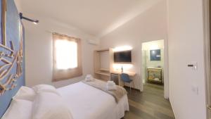 Voodi või voodid majutusasutuse RUDINI' CHARMING ROOM toas