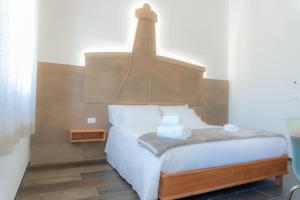 Voodi või voodid majutusasutuse RUDINI' CHARMING ROOM toas