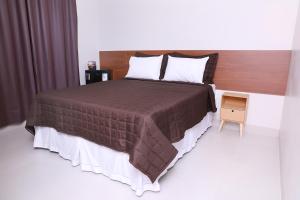 Katil atau katil-katil dalam bilik di Hotel Borges