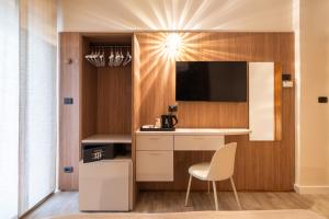 TV a/nebo společenská místnost v ubytování Continental B&B City Hotel