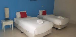 March Samui Resort客房内的一张或多张床位