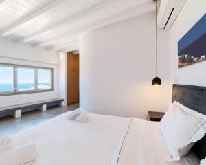 A bed or beds in a room at Villa Agavi - Private Pool & Security included - Ideal for events