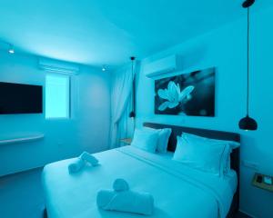 A bed or beds in a room at Villa Agavi - Private Pool & Security included - Ideal for events