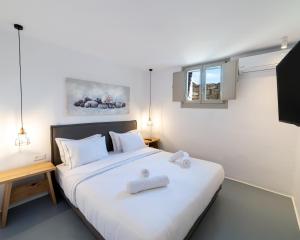 A bed or beds in a room at Villa Agavi - Private Pool & Security included - Ideal for events