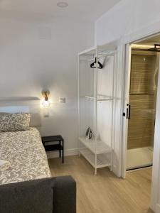 A bed or beds in a room at Bravo Murillo Apartments Még 23 kép
