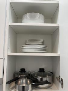A kitchen or kitchenette at Plaza Castilla Apartments