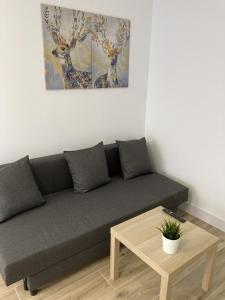 A seating area at Plaza Castilla Apartments