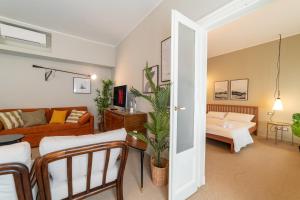 En eller flere senger på et rom på Luxury Apartment Brera - Centro