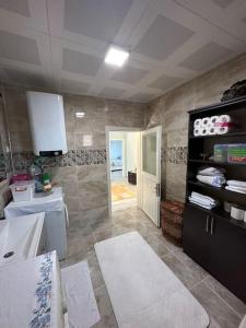a bathroom with a sink and a counter top at Xudisa Manzaram in Pazar