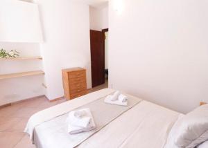 Cama o camas de una habitación en Villetta 100m to sea