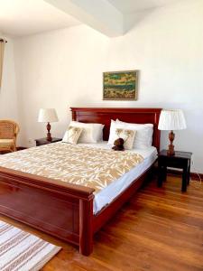 En eller flere senge i et værelse på Spice of Ceylon