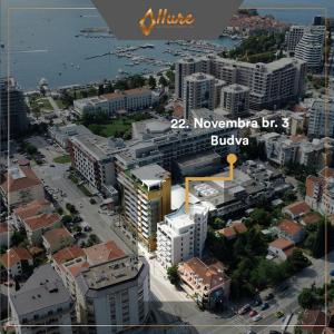 an aerial view of a city with buildings at Kondo Hotel Allure in Budva