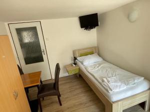 Postel nebo postele na pokoji v ubytování Penzion Nová Hospoda