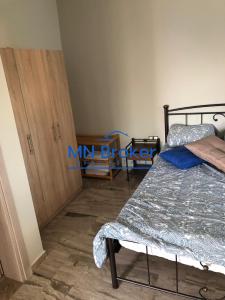 Postel nebo postele na pokoji v ubytování NA House 1
