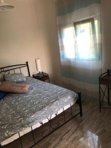 Postel nebo postele na pokoji v ubytování NA House 1
