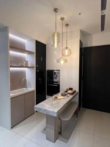 Kuchyň nebo kuchyňský kout v ubytování Enjoy Live 享住 台中公寓式住宿