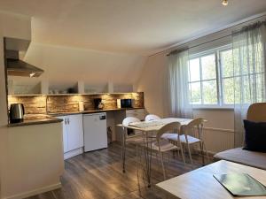 Kuchyň nebo kuchyňský kout v ubytování Holiday apartment on western Gotland