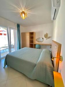 a bedroom with a large bed in a room at Calypso Luxury Pool&Spa in Pula