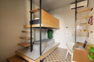 Cama o camas de una habitación en 'RE-Dama Hostel