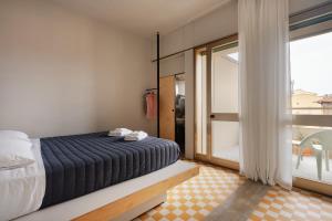 Cama o camas de una habitación en 'RE-Dama Hostel