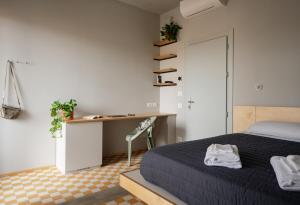 Cama o camas de una habitación en 'RE-Dama Hostel
