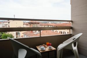 Un balcón o terraza de 'RE-Dama Hostel