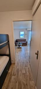 Ένα ή περισσότερα κρεβάτια σε δωμάτιο στο Appartement La Baule Le Cocon des Lilas