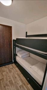 Ένα ή περισσότερα κρεβάτια σε δωμάτιο στο Appartement La Baule Le Cocon des Lilas