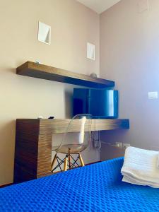 TV a/nebo společenská místnost v ubytování B&B L'Orizzonte