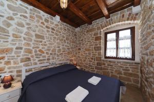 Ένα ή περισσότερα κρεβάτια σε δωμάτιο στο Villa Josipa +13 φωτογραφίες