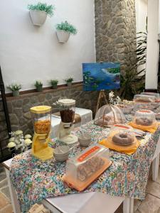 a table with some food on top of it at Tenuta Santa Caterina in Rossano +99 photos