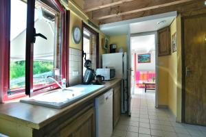 Η κουζίνα ή μικρή κουζίνα στο Maison en Bois +7 φωτογραφίες