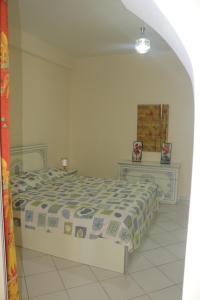 Ένα ή περισσότερα κρεβάτια σε δωμάτιο στο appartement julia au centre ville agadir dans résidence borj dalat