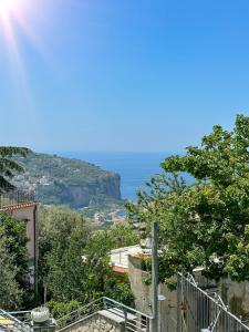 a view of the ocean from a building at Annarosa Home in Vico Equense