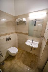 Koupelna v ubytování Avenue 11 Premium Stays Madurai