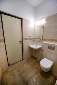 Koupelna v ubytování Avenue 11 Premium Stays Madurai
